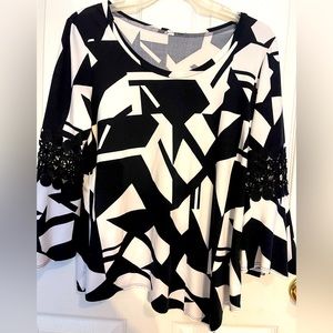 Black and white asymmetrical top